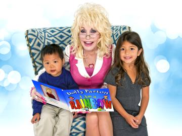 Dolly Parton reading to two young children