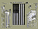 U.S. Flag Over Middle Of Street